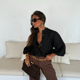 Blusa de lino con mangas globo en color negro